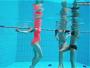 three naked ladies have joy underwater